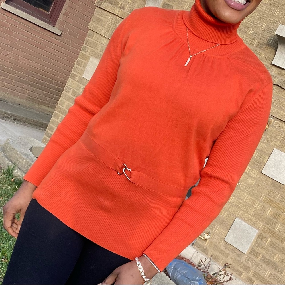 Orange colored top size L